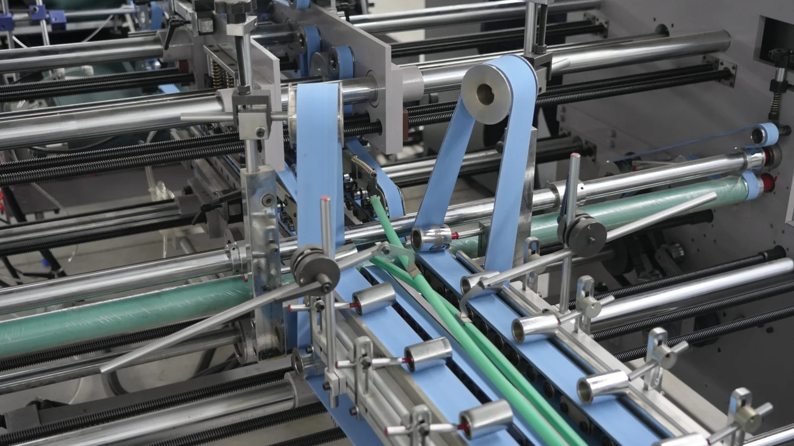 Rollers, belts and transfer mechanisms
